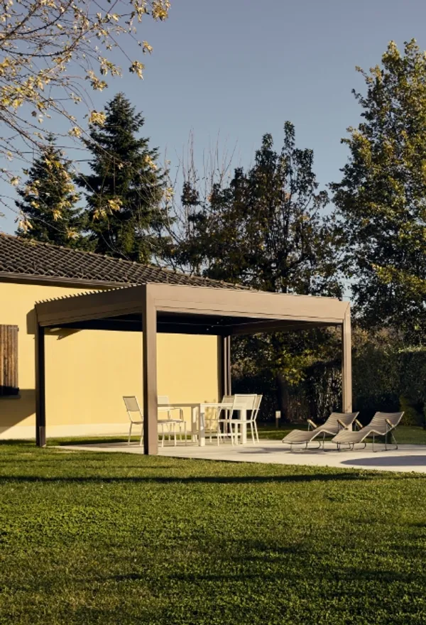 Modern garden pergola with dining set.